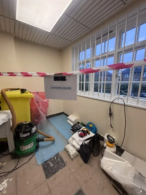 Asbestos floor tile and bitumen removal in Mill Hill